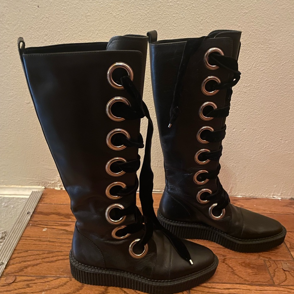 Rare Marc Jacobs black tall boots. Never worn.